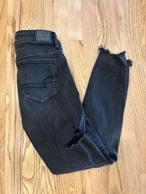 American Eagle Outfitters Black Skinny Jeans with Distressed Hem